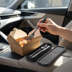 Using the stainless steel fork with a takeaway box in a parked car