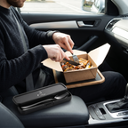 Eating a takeaway in a parked car with the stainless steel knife and fork