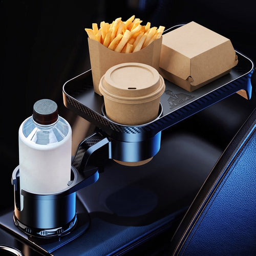 Tray holding a burger box, chips and a drink in a parked car
