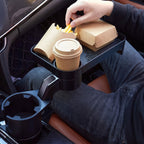 Eating a takeaway from the tray in a parked car